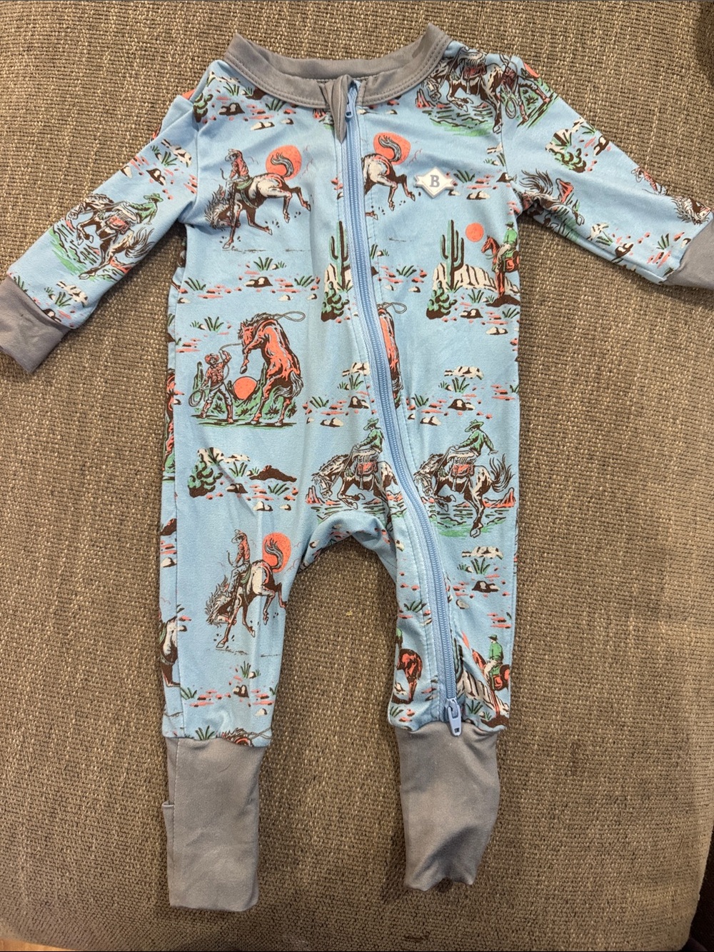 BURLEBO Light Blue Cowboy Print Zip Footed One-Piece